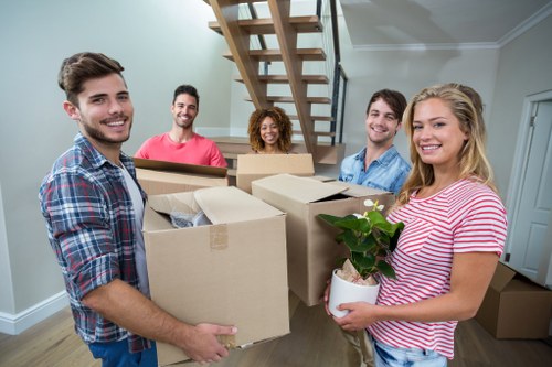 Careful loading of household items by a Belsize Park man and van service