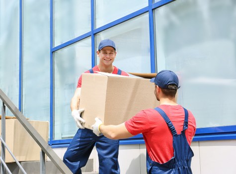 Moving boxes and furniture prepared for house removals in Belsizepark