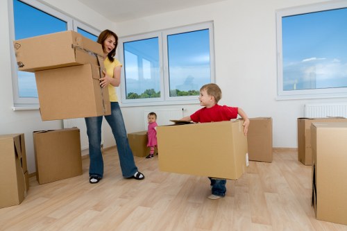 Professional movers handling furniture with care and insurance protection