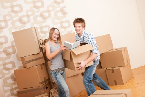 Professional movers handling office items during relocation