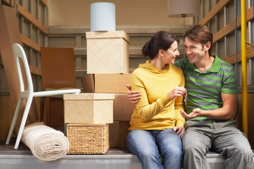 Furniture and boxes being transported by a man and van service