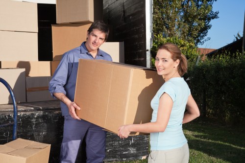Local movers handling furniture in Belsizepark